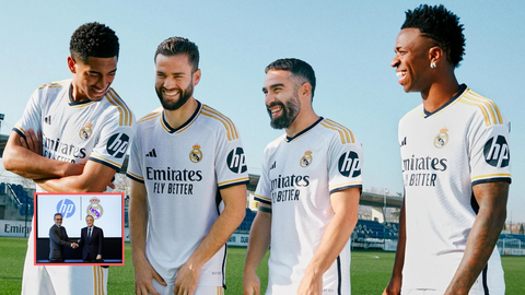 Los jugadores del Real Madrid posan con el logo de HP. Abajo, el presidente del Real Madrid, Florentino P&eacute;rez (der.) y el respomsable de Marketing de HP, Antonio Lucio